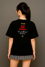 A lady wearing a black King Santona T-shirt with Glory Glory at the back made by Unique for Fans
