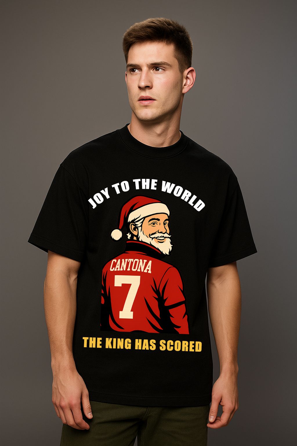A man wearing a black King Santona T-Shirt made by Unique for Fans